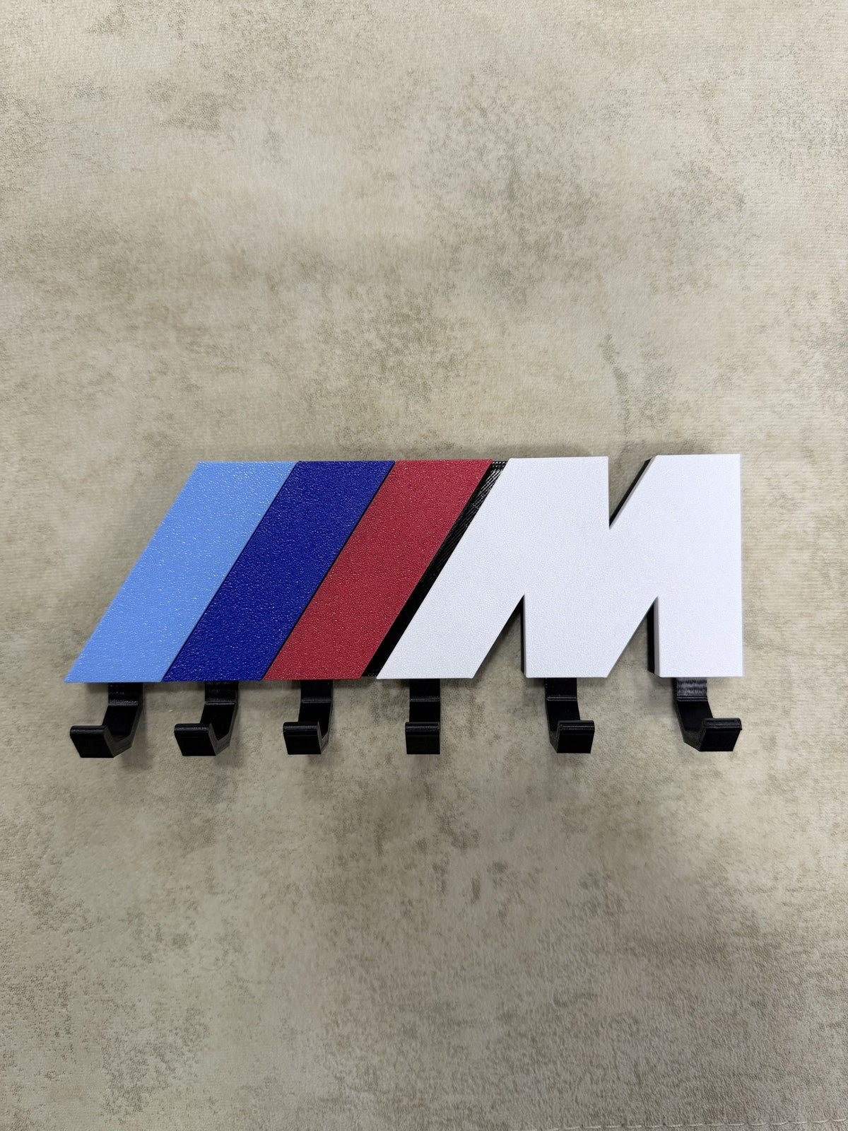 BMW M Stripe key holder rack front view with UMPARTS Accessories logo