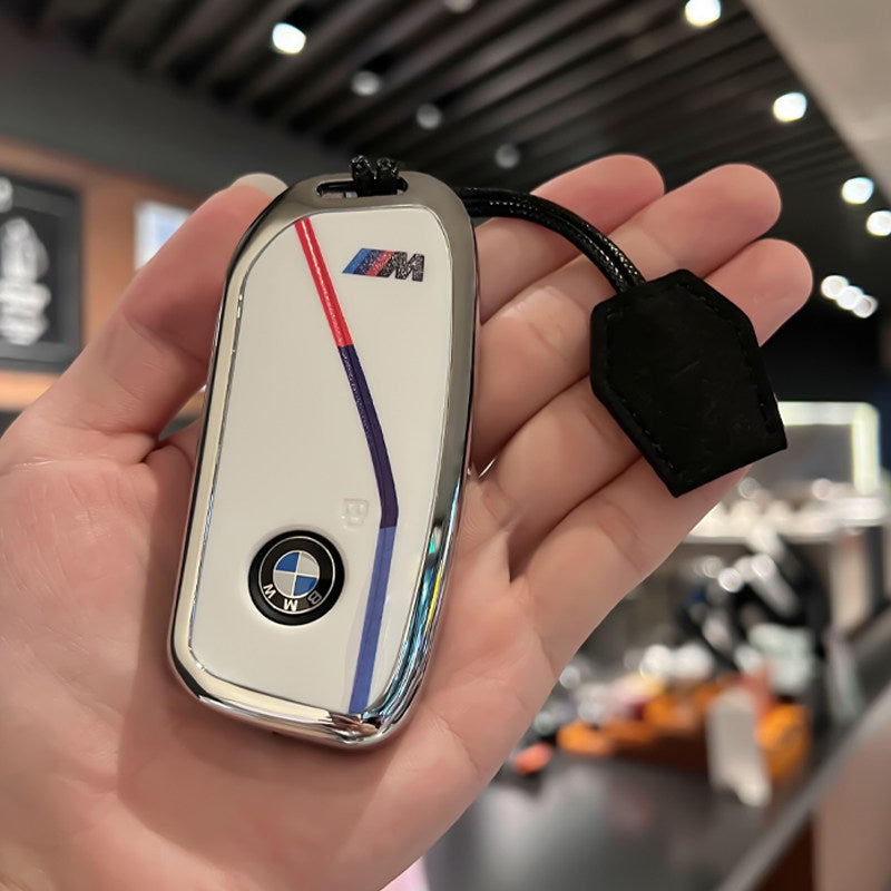 BMW Zinc Alloy Key Fob Case – New-Generation Key, Tricolor Stripe Design with Keychain Options